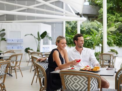 Couple dining together outdoors at RACV Royal Pines